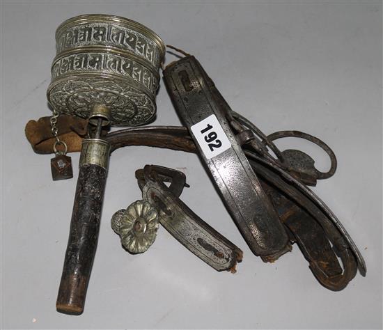 A Tibetan belt and a prayer wheel